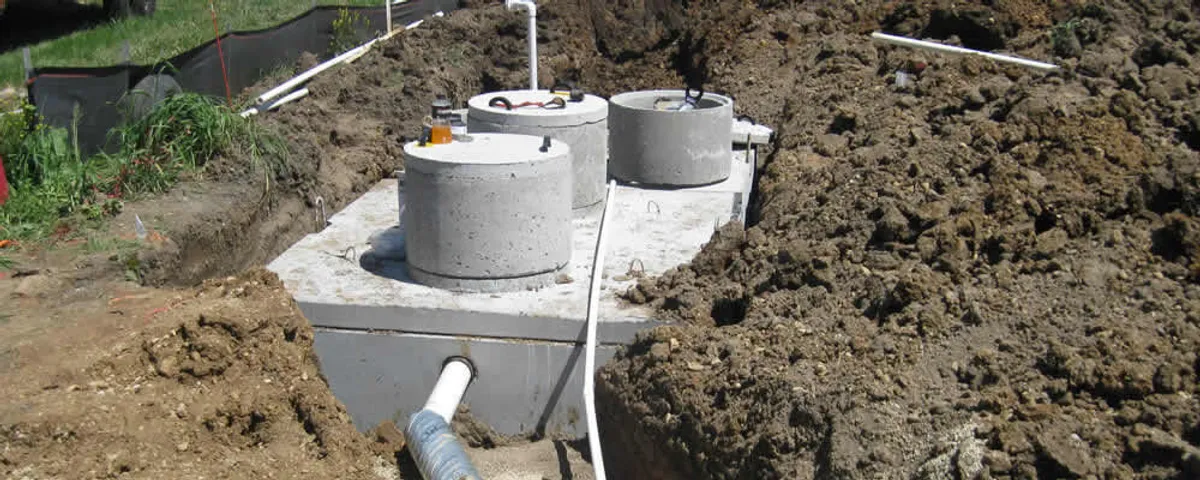 Septic system repair and installation site with tank access ports in Tucson, AZ